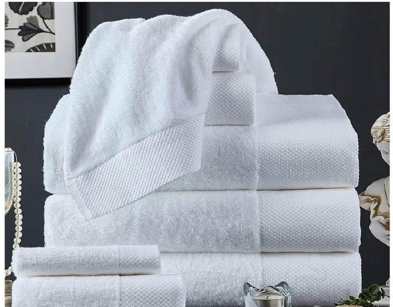 Towelling stack — bath, hand and face towels